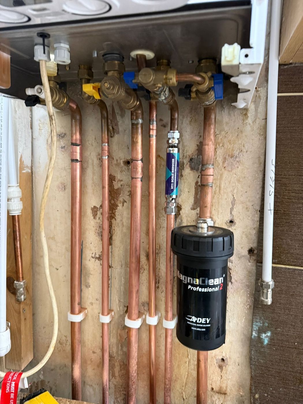 Magnetic system filter fitted to boiler pipework